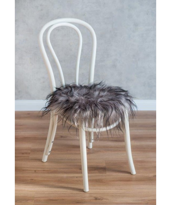 Sitzauflage mit langem Fell.